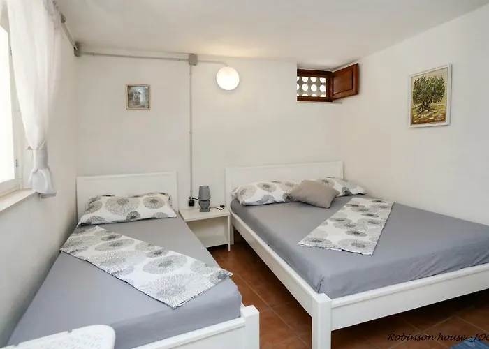 Robinson House Jogo *