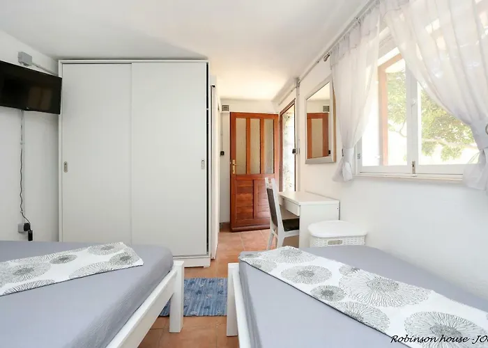 Robinson House Jogo *